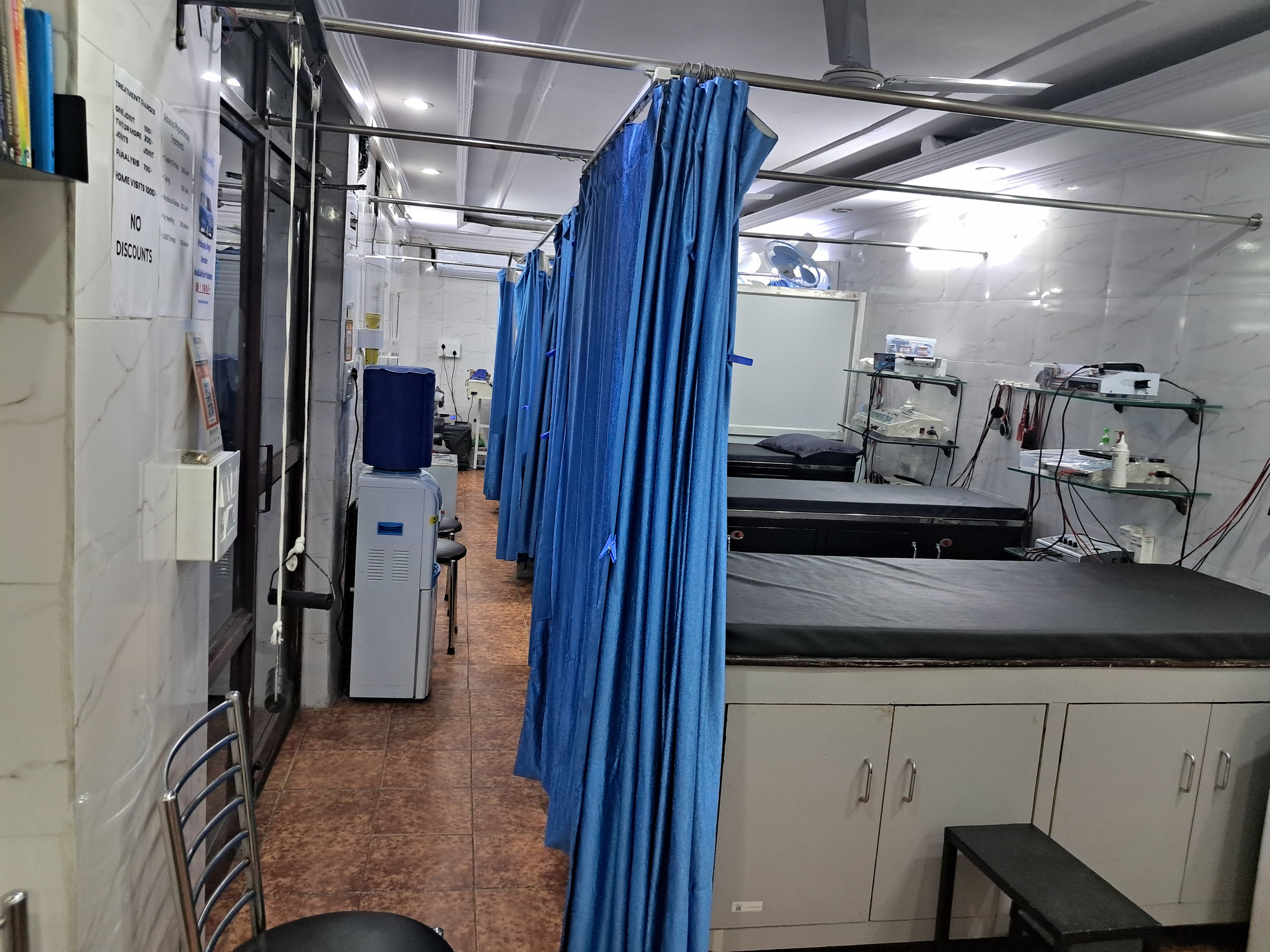 Physiotherapy treatment room with equipment